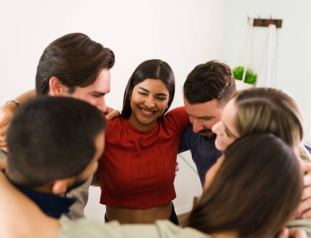 meeting-support-group-cheerful-members-rehab-group-hugging-celebrating-great-talk-about-mental-health-min meeting-support-group-cheerful-members-rehab-group-hugging-celebrating-great-talk-about-mental-health-min